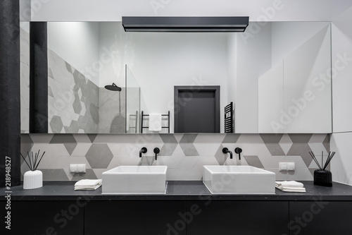 Minimalist bathroom with two basins