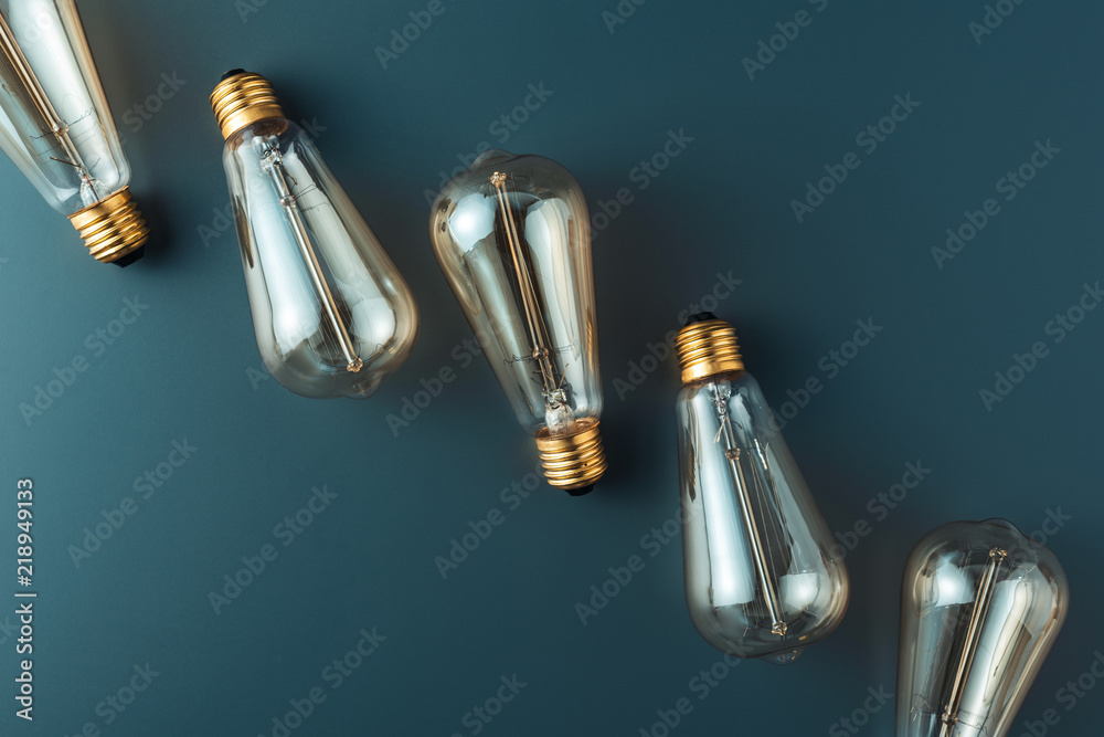 close-up view of light bulbs on grey background, energy concept close-up view of light bulbs on grey background, energy concept