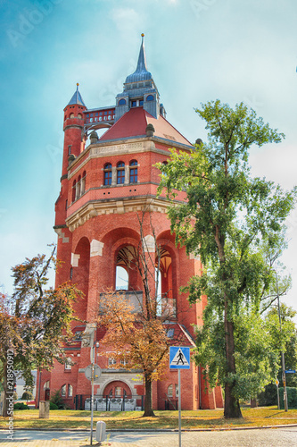 WROCLAW, POLAND - AUGUST 18, 2018: The water tower at Sudecka Street in Wroclaw, 63 meters high, designed by Karl Klimm. Built 1904-1905, situated in Borek, the district of Krzyki, Wroclaw, Poland. photo
