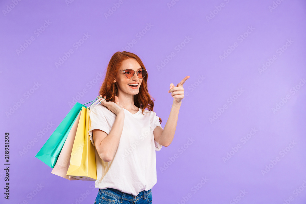 Portrait of a shocked young girl in sunglasses Portrait of a shocked young girl in sunglasses