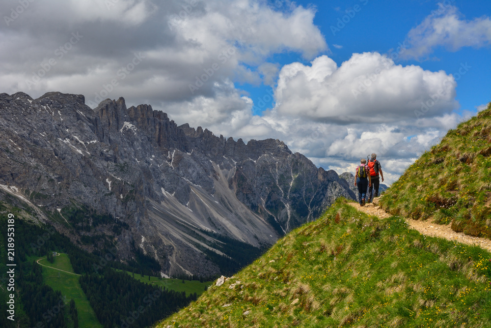 Fototapeta premium Italy Dolomites Latemar hikers