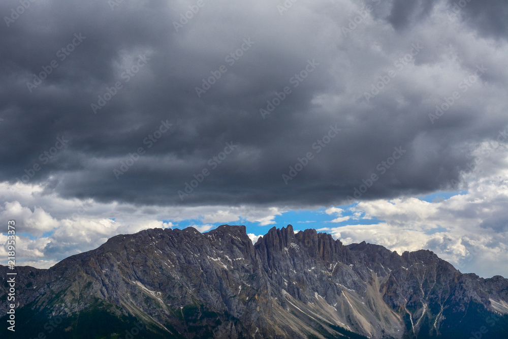 Italy Dolomites Latemar stormcloud