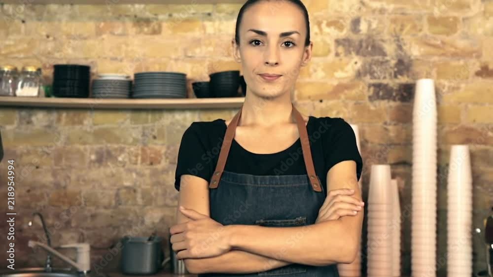 Portrait of seкious looking woman, coffee shop owner, looking at camera. Portrait of seкious looking woman, coffee shop owner, looking at camera.