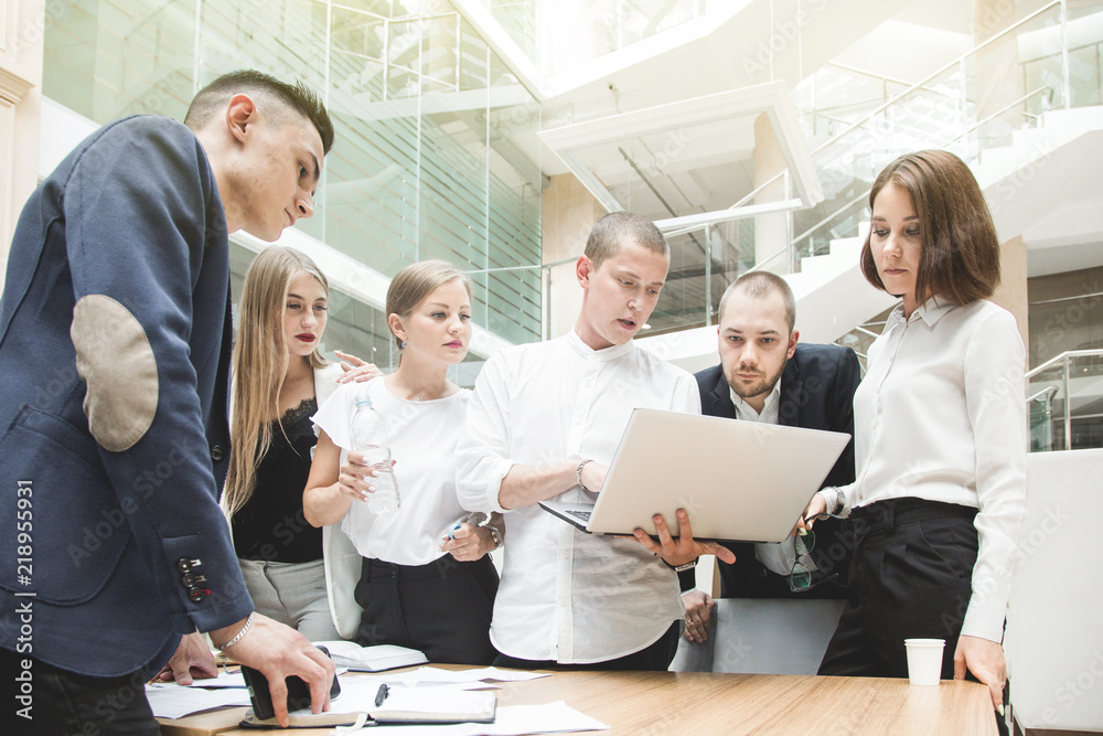 Group of business meeting at the table in the modern office ,Team work and diverse hands together joining business relationships with greetings and joint business partnership.