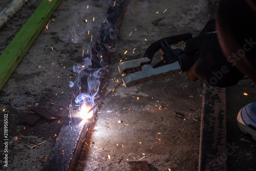 Ironman is convinced by electric welding machine.