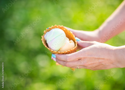 ice cream cone in hands