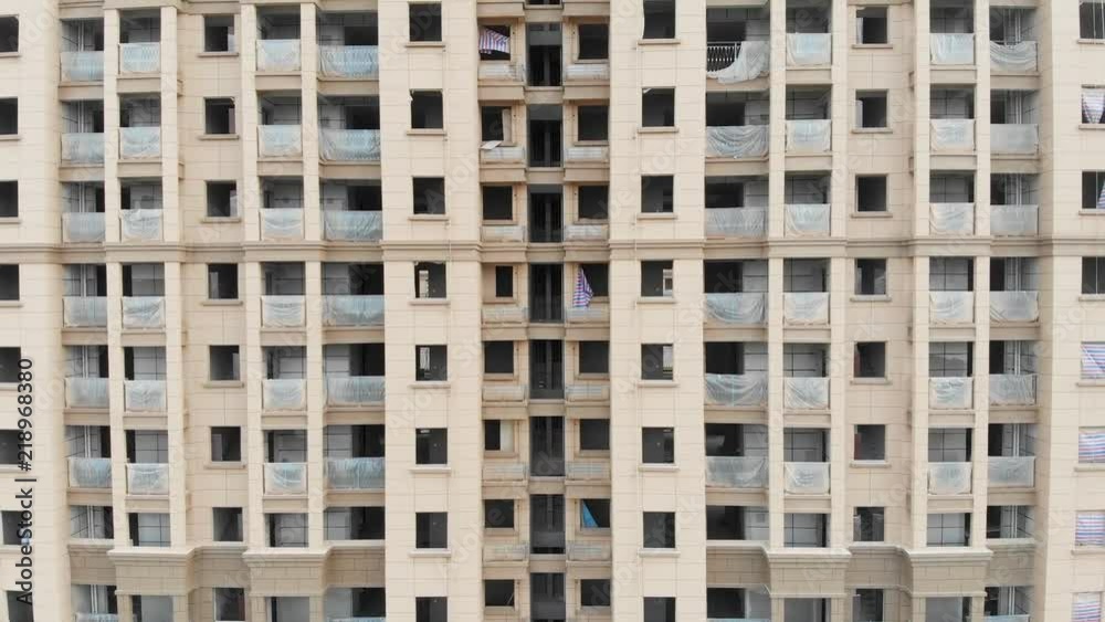 Abandoned residential apartment construction in China. Ghost building, where construction stopped, no people to move in. Supply outstrips demand in Chinese housing market. Abandoned residential apartment construction in China. Ghost building, where construction stopped, no people to move in. Supply outstrips demand in Chinese housing market.