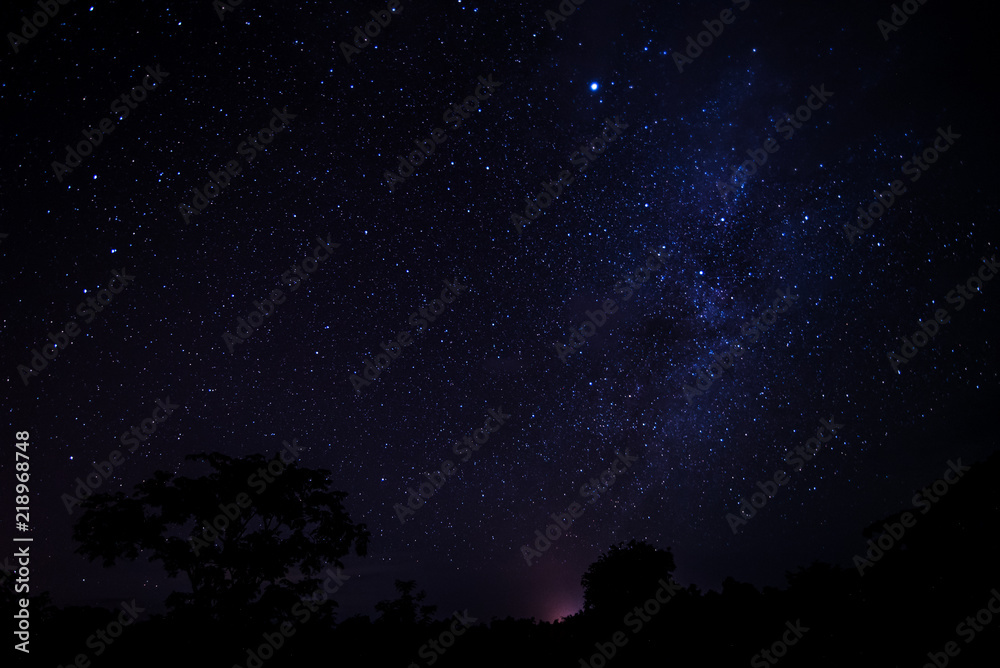 Night sky stars with milky way on mountain background Night sky stars with milky way on mountain background