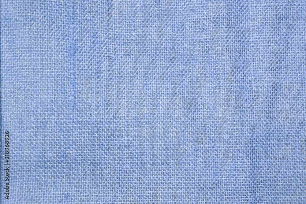 Closeup blank blue hessian texture background Closeup blank blue hessian texture background