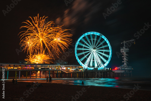 Fotografia Scheveningen beach in the Netherlands and fireworkshow at night