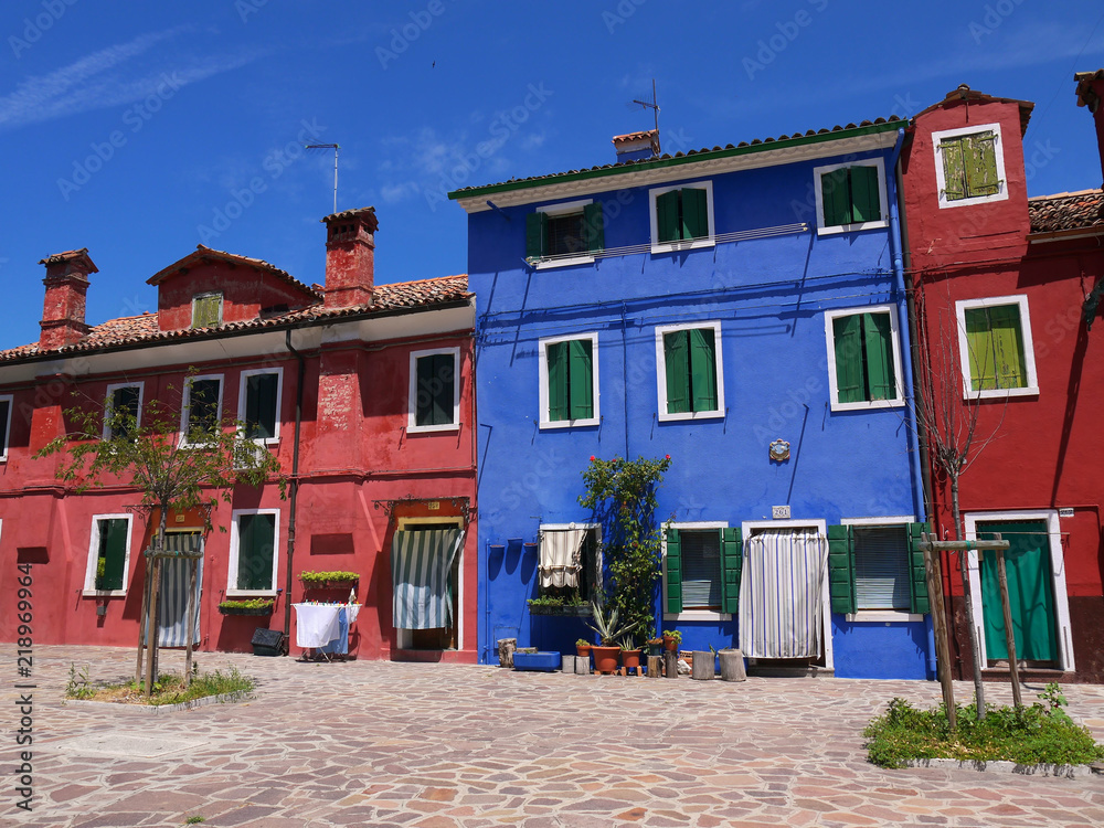 Fototapeta premium The houses painted in brilliant pastel shades at Burano Italy