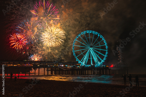 Fotografia Scheveningen beach in the Netherlands and fireworkshow at night