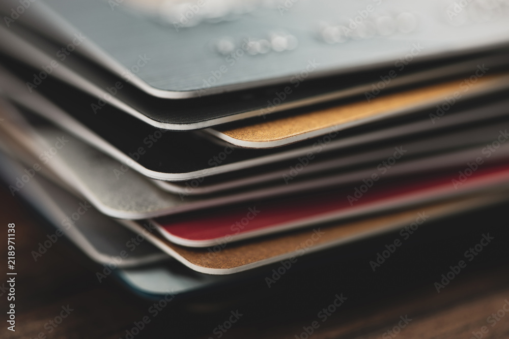 Stack of multicolored credit cards close-up Stack of multicolored credit cards close-up