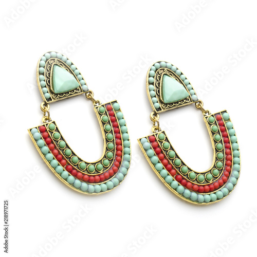 earrings in Boho style with mint and coral beads isolated on white photo