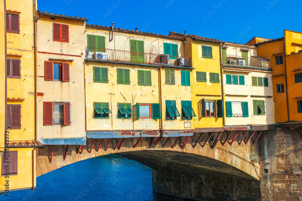 View on the Arno river and the historic architecture in Florence, Italy.