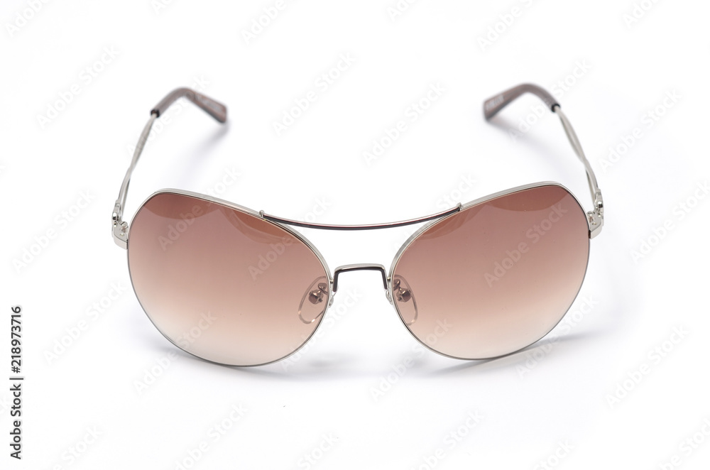 women's sunglasses with brown glass isolated on white women's sunglasses with brown glass isolated on white