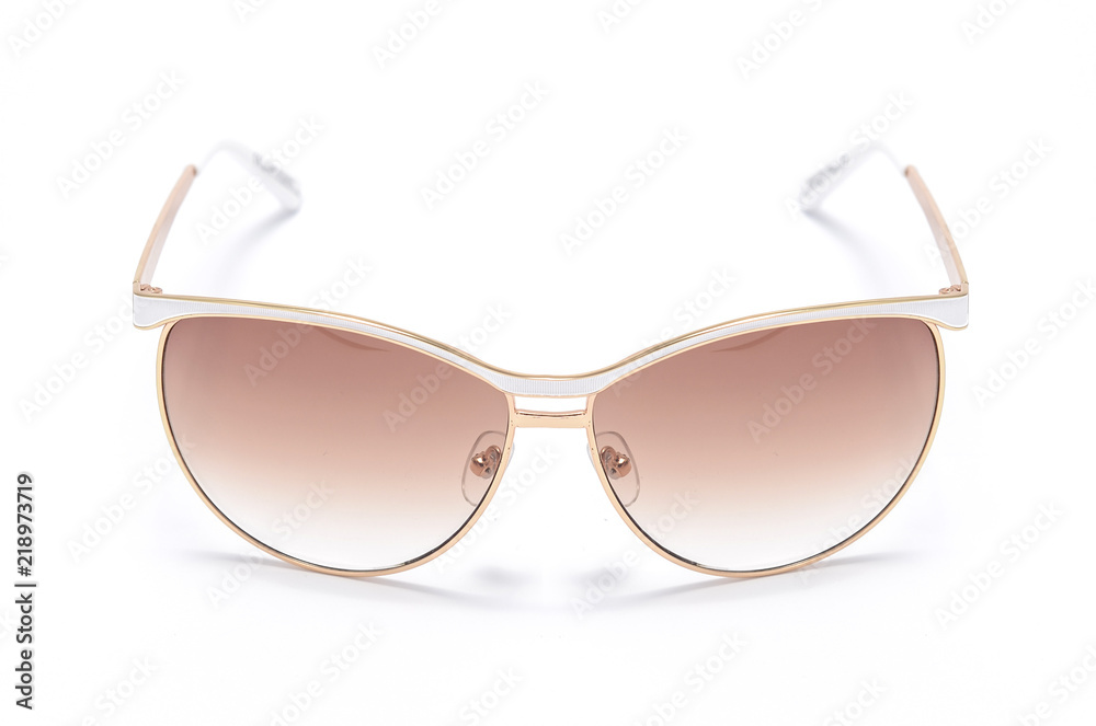 Sunglasses in an iron frame with brown glass isolated on white Sunglasses in an iron frame with brown glass isolated on white