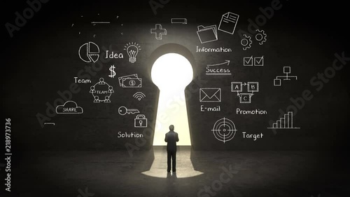 Businessman standing in front of Keyhole, Business plan and various graph in black wall concept. 4k movie.2.