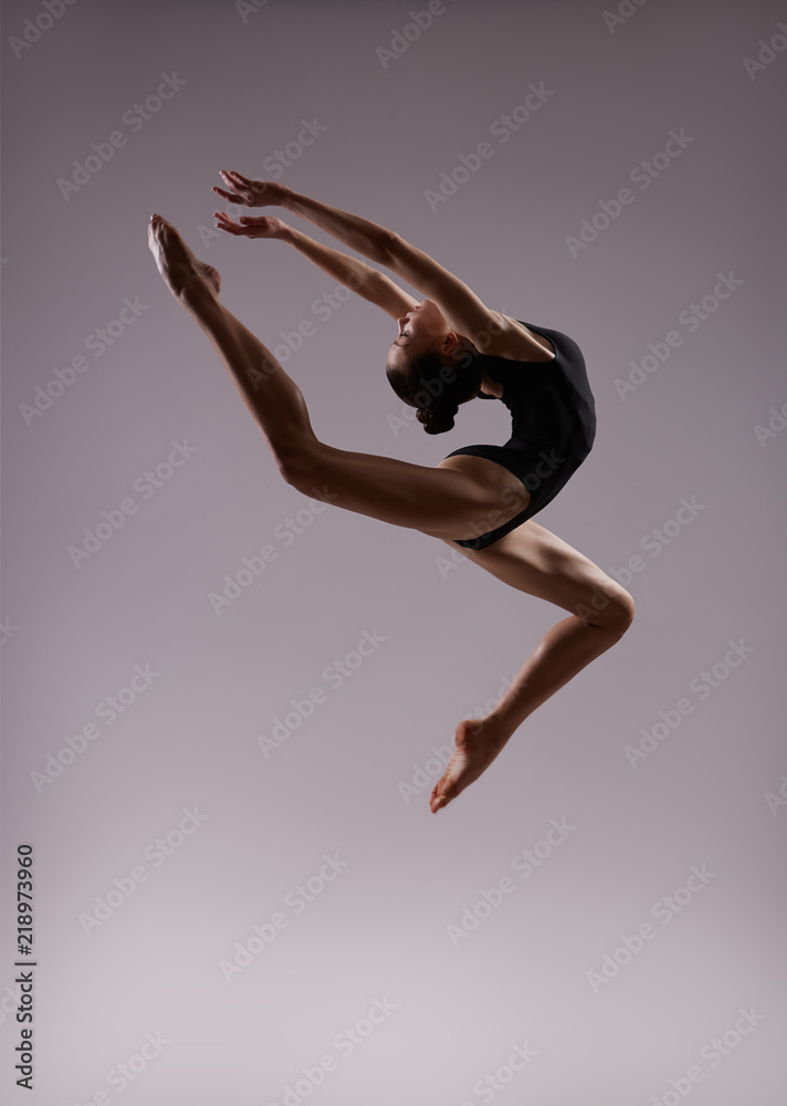 Flexible girl in a jump