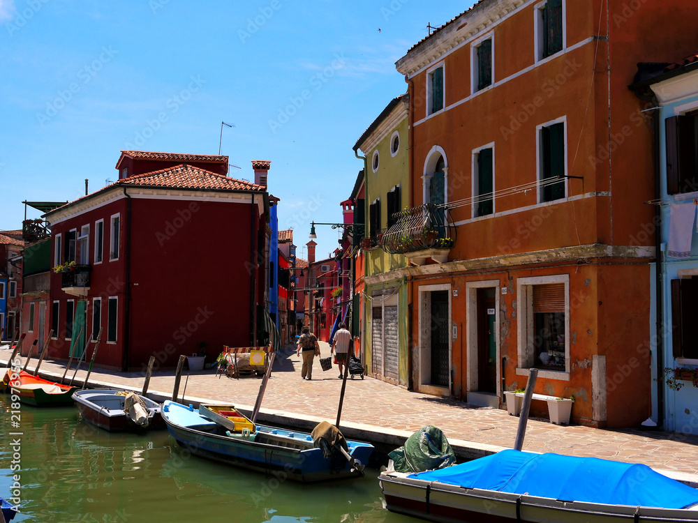 The romantic houses painted in brilliant pastel shades on the Island of Burano Italy