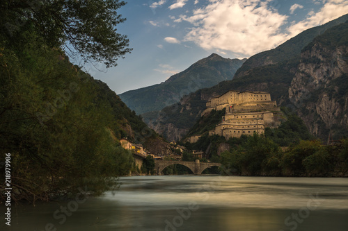 aosta old stone castle with river in north italy cloudy sky forte di bard