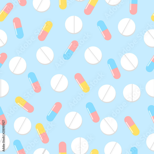 Colorful pills seamless pattern. Vector background. Seamless texture realistic tablets on blue background