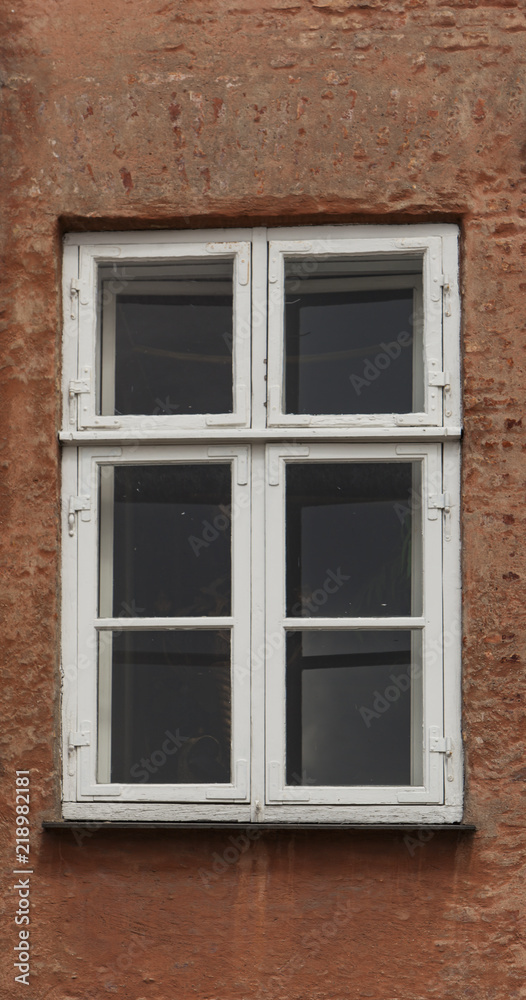 Window on the colorful facade