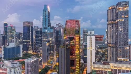 Aerial view of Chinatown and Downotwn of Singapore day to night timelapse photo