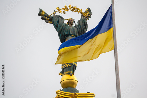 Independence monument and ukrainian flag in Kiev. Ukraine