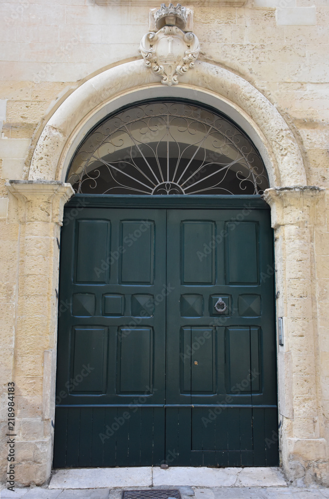 Italy, Lecce, ancient buildings and streets of the old town, views and details, doors, windows and various architectures.