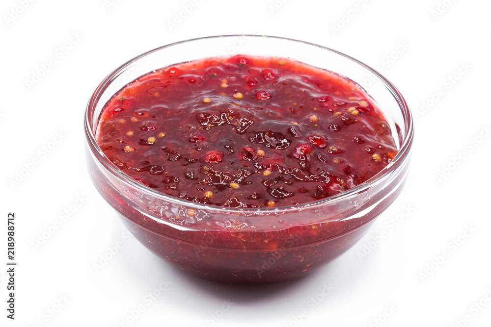 Cranberry sauce in bowl for Thanksgiving dinner isolated on white background