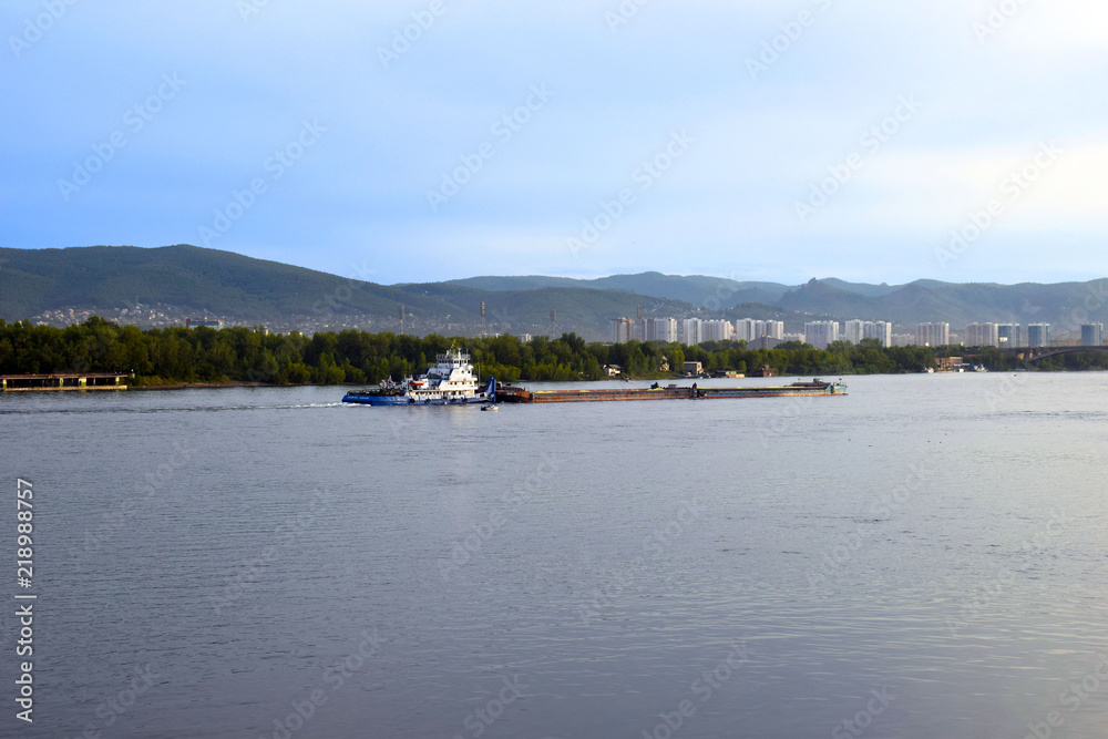 Krasnoyarsk. Russia. August 19, 2018. Two ships meet on the river. Siberian nature. Cruise on the Yenisei river.