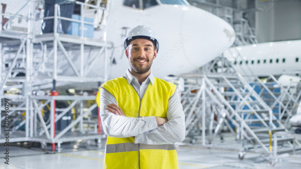 Obraz premium Portrait of Aircraft Maintenance Mechanic in Safety Vest