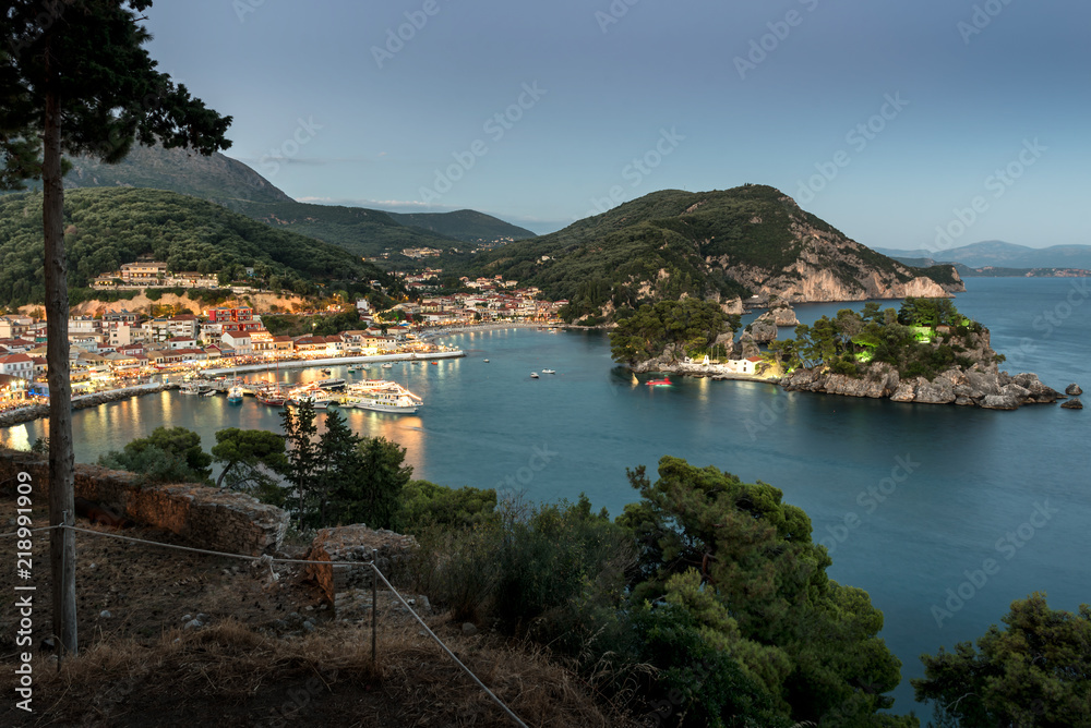Panoramic view of the resort town of Parga, the harbor, the beach and islets at sunset (region of Epirus, Greece)