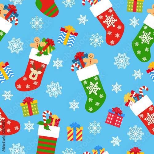 Seamless pattern Christmas socks with gifts on a blue background