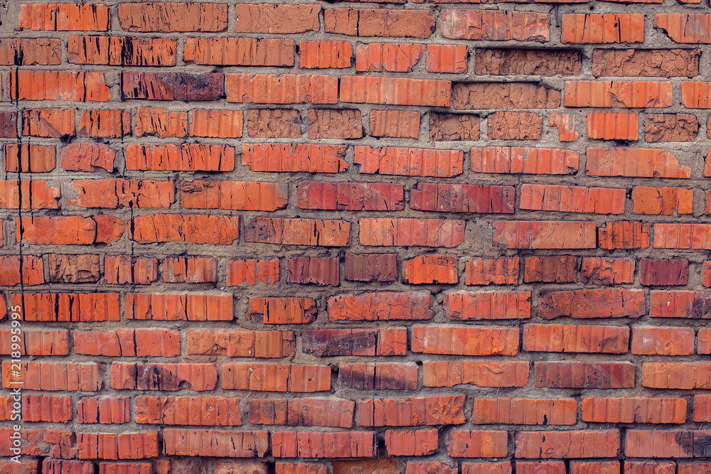 Obraz premium Red bricks wall background vintage and modern texture