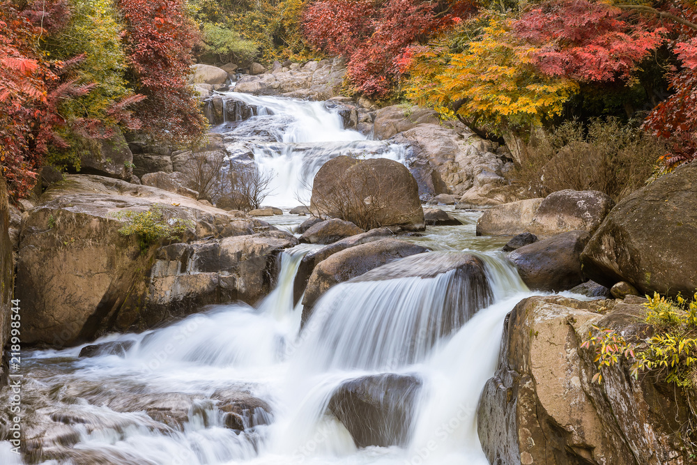 Waterfall in national park during autumn