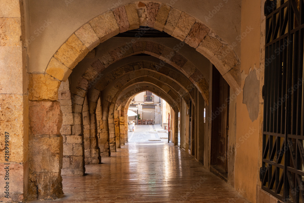 Medieval arches in a mediterranean city