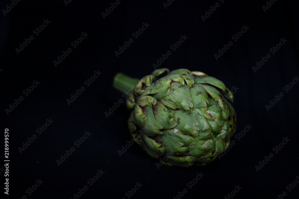 Obraz premium artichoke on the black background