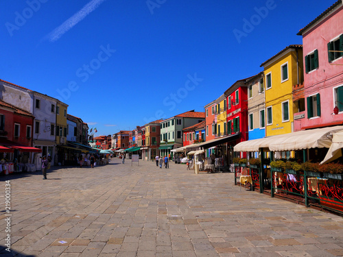 The romantic houses painted in brilliant pastel shades on the Island of Burano Italy © steve