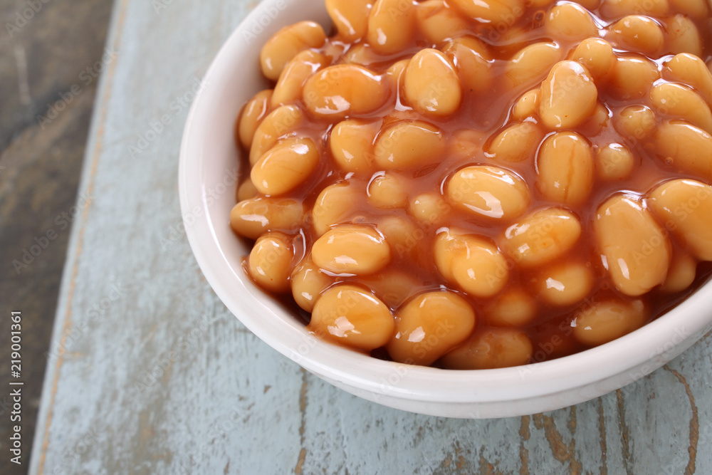 baked beans in tomato sauce in white dish baked beans in tomato sauce in white dish