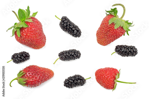 Strawberries and mulberries isolated on white. Top view