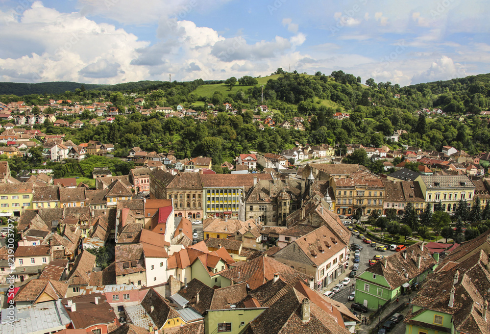 Panoramic view over the cityscape and roof architecture in Sighisoara, medieval town of Transylvania, Romania