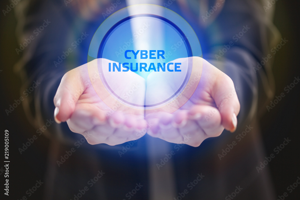 The concept of business, technology, the Internet and the network. A young entrepreneur working on a virtual screen of the future and sees the inscription: Cyber insurance The concept of business, technology, the Internet and the network. A young entrepreneur working on a virtual screen of the future and sees the inscription: Cyber insurance