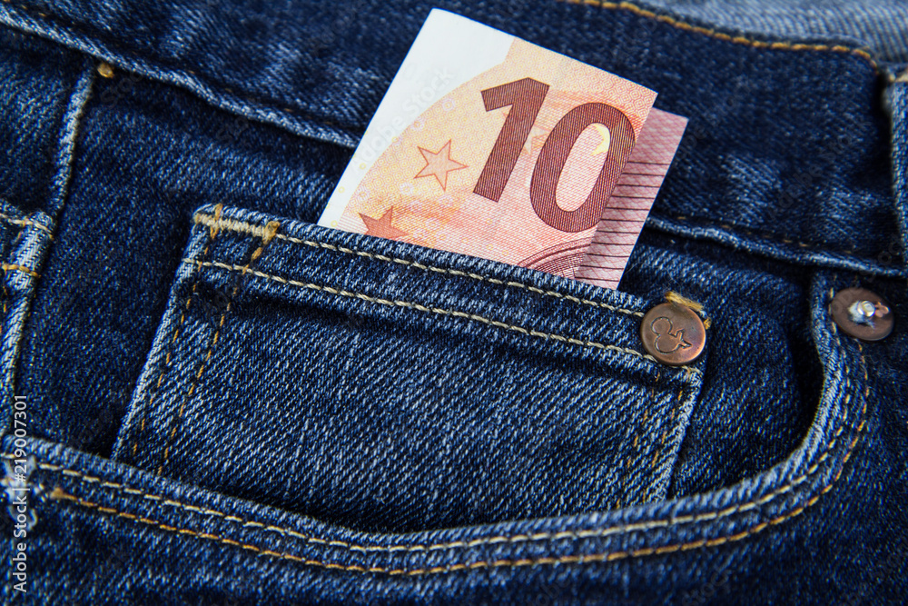 Euro note in a blue jeans pocket Stock Photo | Adobe Stock