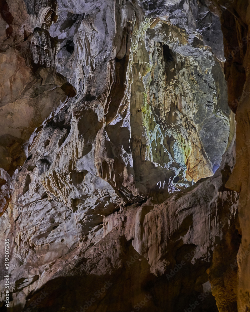formations of stalactites and stalagmites in underground cave