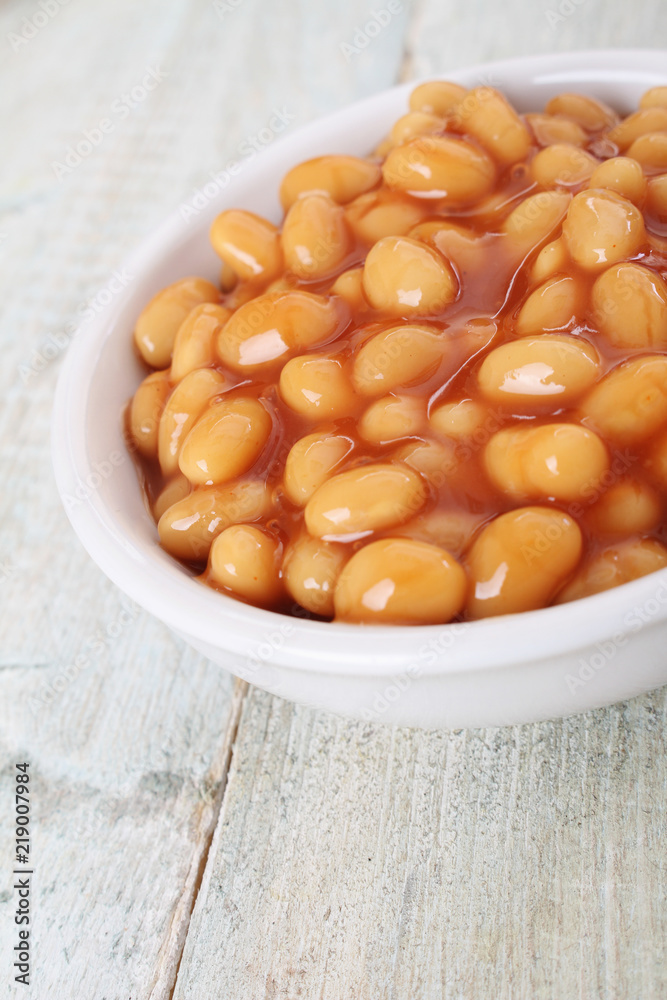 baked beans in tomato sauce in white dish baked beans in tomato sauce in white dish