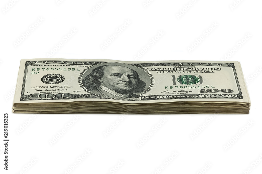 A small stack of one hundred dollar bills on a white background. View at an angle. A small stack of one hundred dollar bills on a white background. View at an angle.