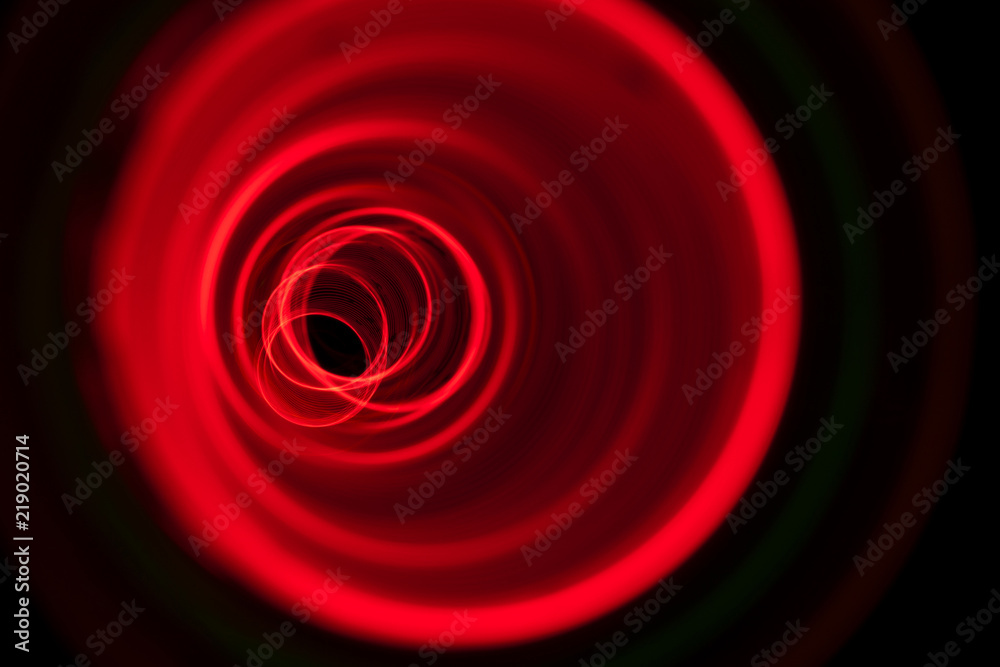 abstract gyre, circle rings, drawings with light at long exposure, black background abstract gyre, circle rings, drawings with light at long exposure, black background