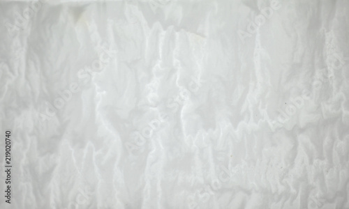 Background of textures and abstract patterns of white paper wall.
